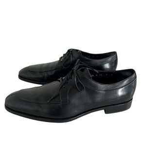 Salvatore Ferragamo 
Sleek Black Leather Oxfords with Glossy Finish
